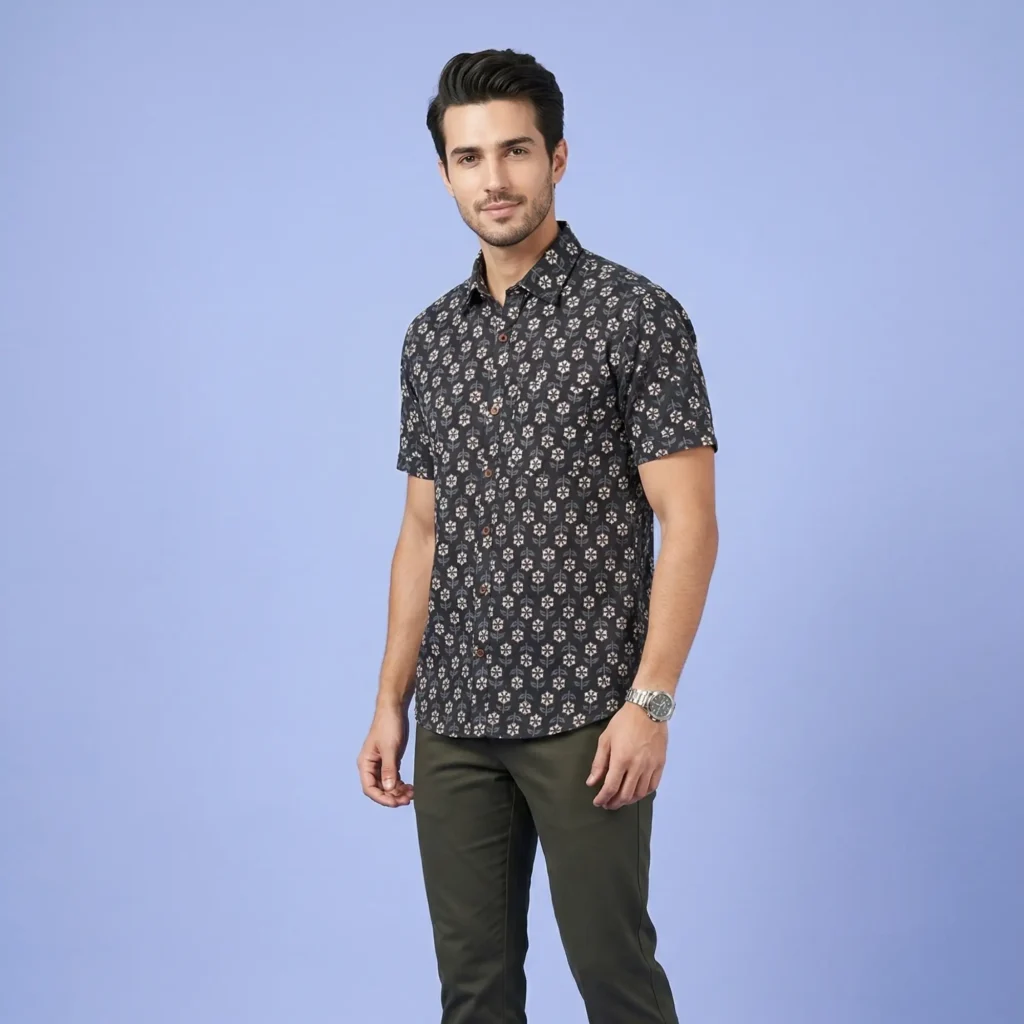 Men wearing black floral cotton shirt paired with olive trousers casual party outfit