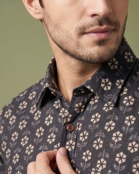Men’s black floral printed cotton shirt with classic spread collar close-up